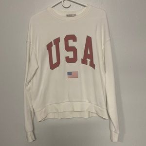 USA sweater from a store in Europe
